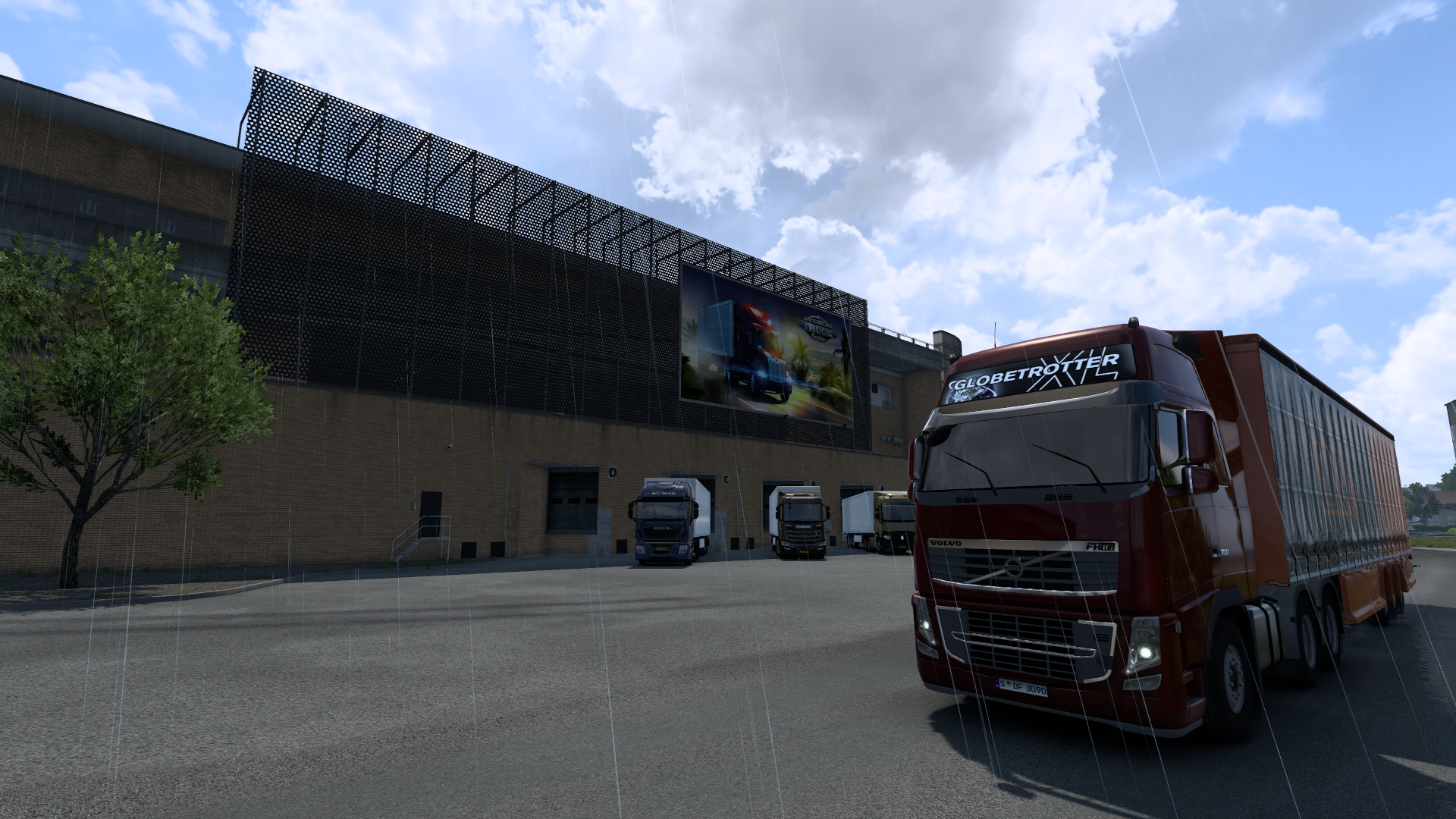 Logistik-Hof bei Regen mit mehreren Lkw und Werbeplakat an der Hallenfassade