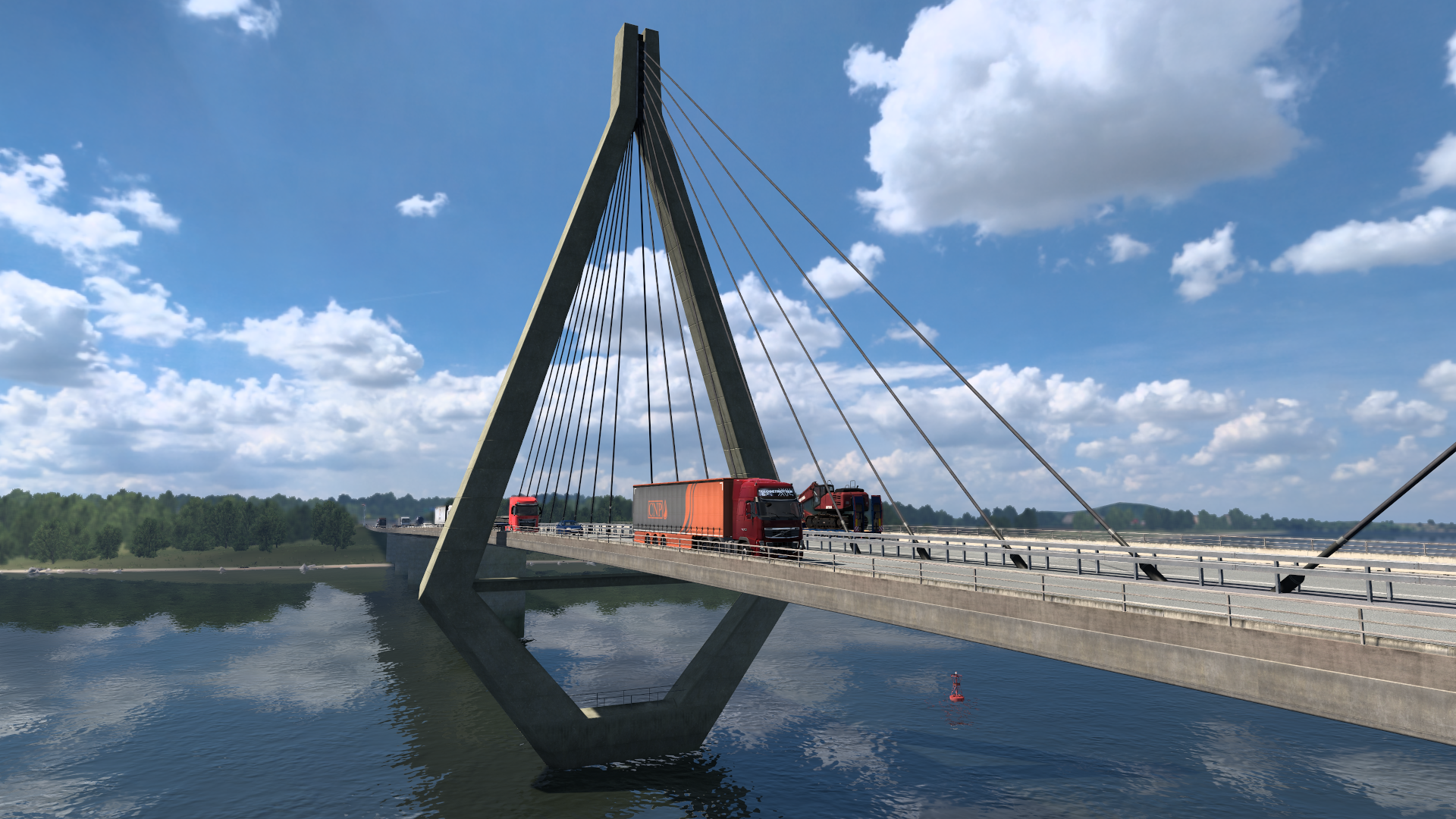 Farøbroerne mit CNP-Sattelzug auf der Fahrbahn über ruhigem Wasser